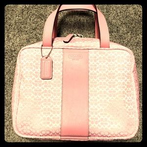 Coach cosmetic bag.